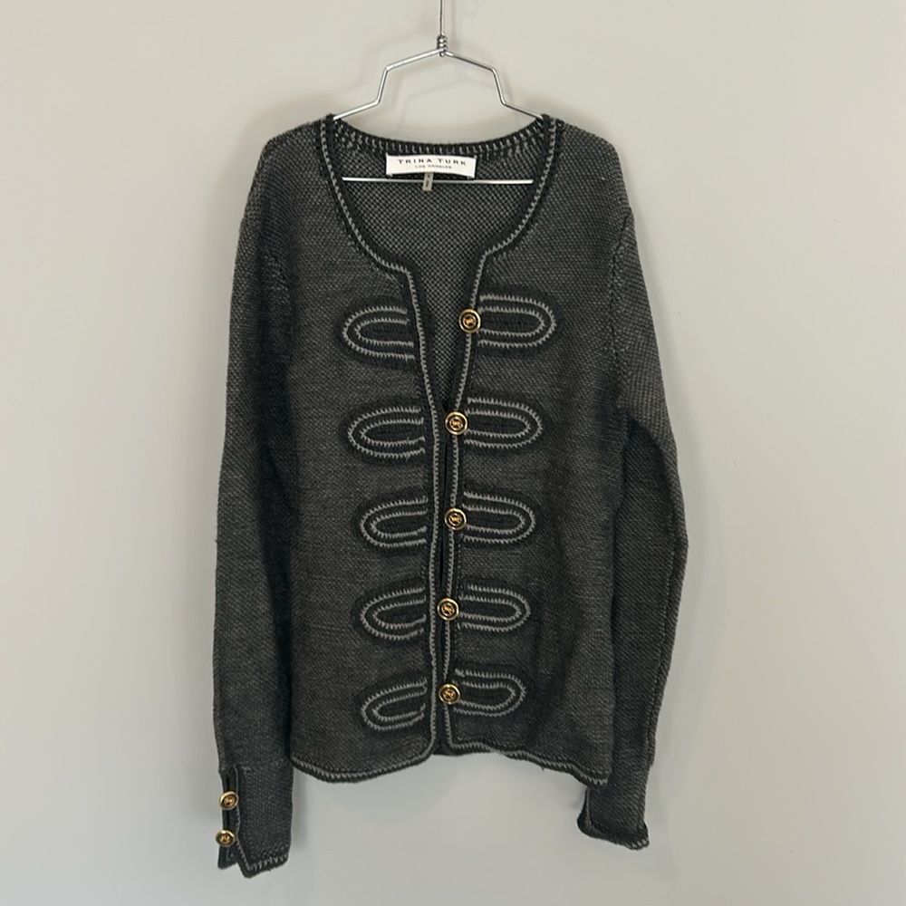 Trina Turk grey merino wool knit sweater with military style button closure.